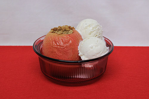 Baked apple crisp with ice cream