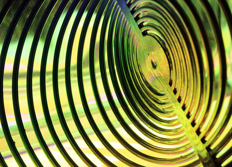 Plastic wind spinner illuminated from behind